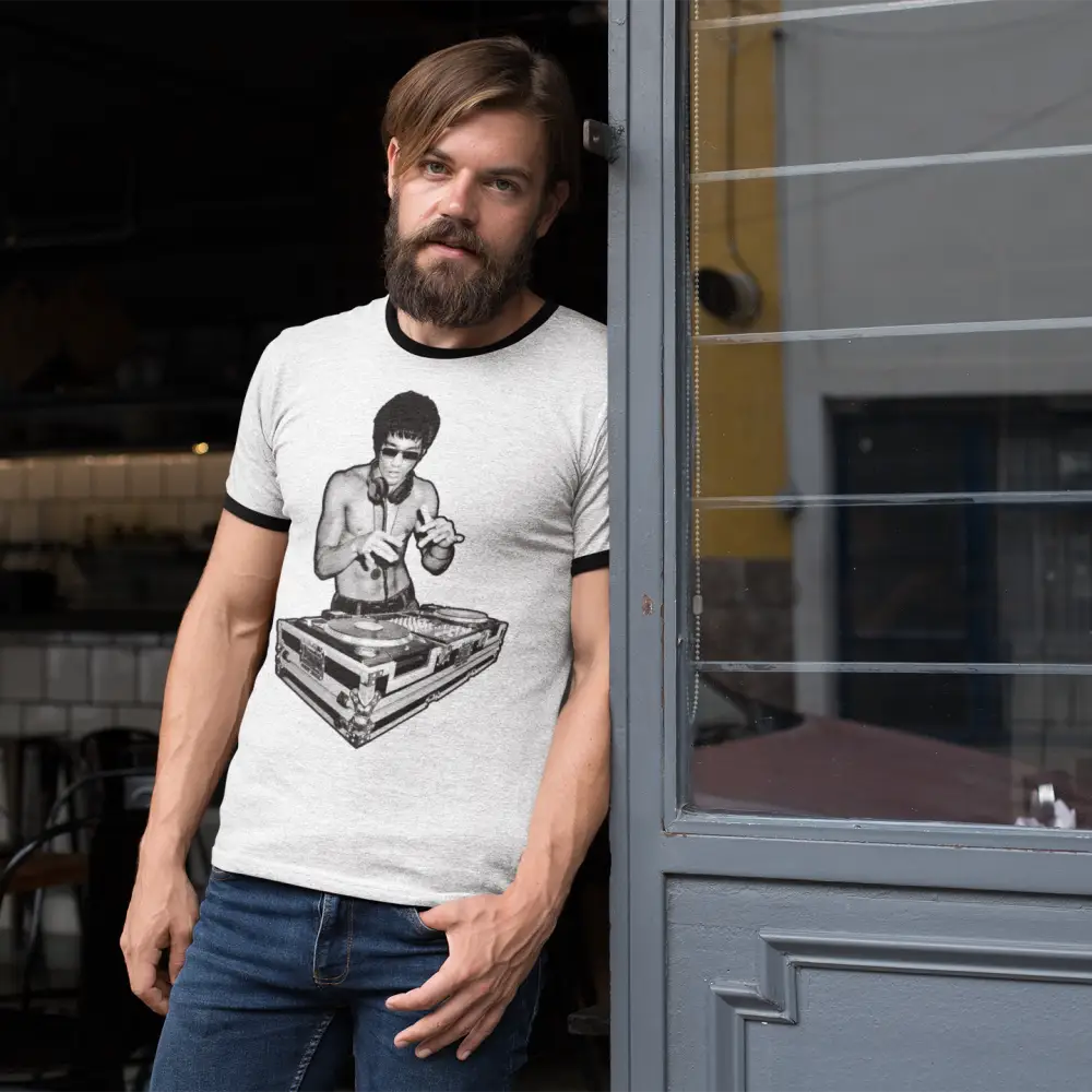 Bearded man in white DJ Bruce Outline Ringer T-Shirt inspired by Bruce Lee