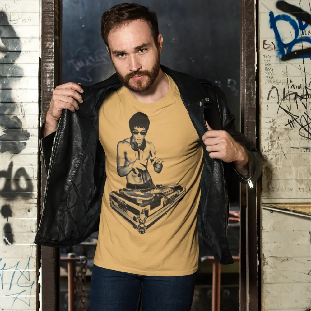 Person in yellow DJ Bruce T-Shirt with boxer graphic and black leather jacket