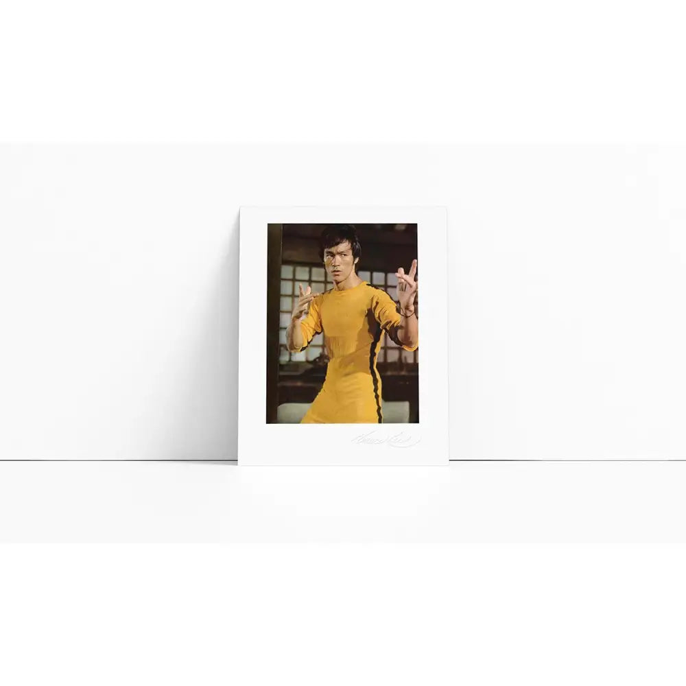Bruce Lee in yellow jumpsuit featured in In My Own Process Limited Edition hardback