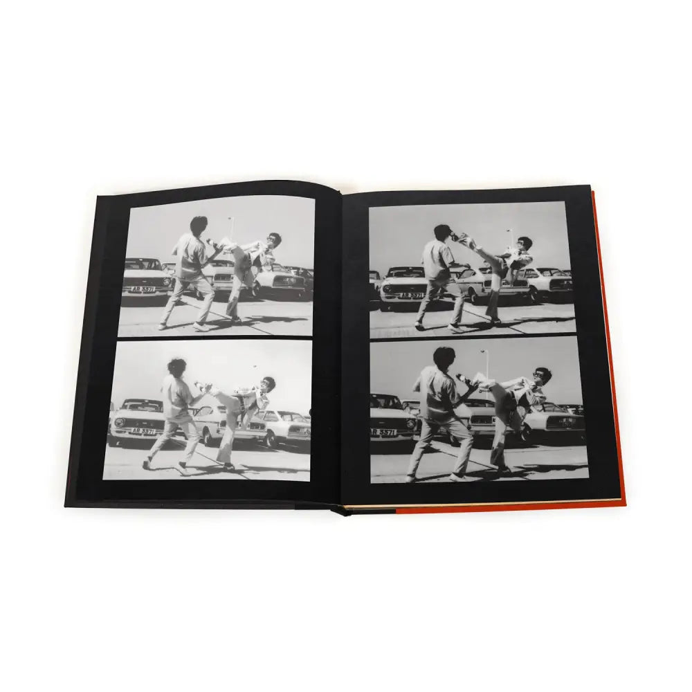 Open book showcasing martial arts photos in Bruce Lee’s Limited Edition hardback