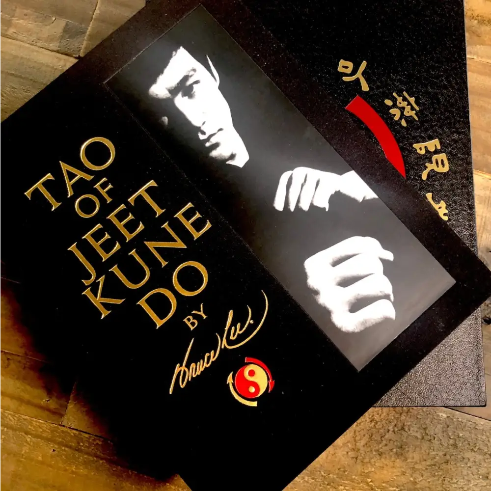 Tao of Jeet Kune Do book cover featuring a portrait of Bruce Lee in black and white