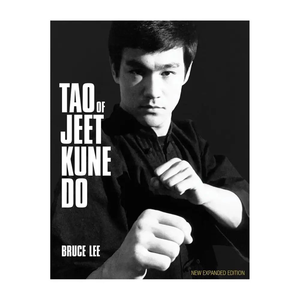 Book cover of Tao of Jeet Kune Do featuring Bruce Lee in a martial arts stance