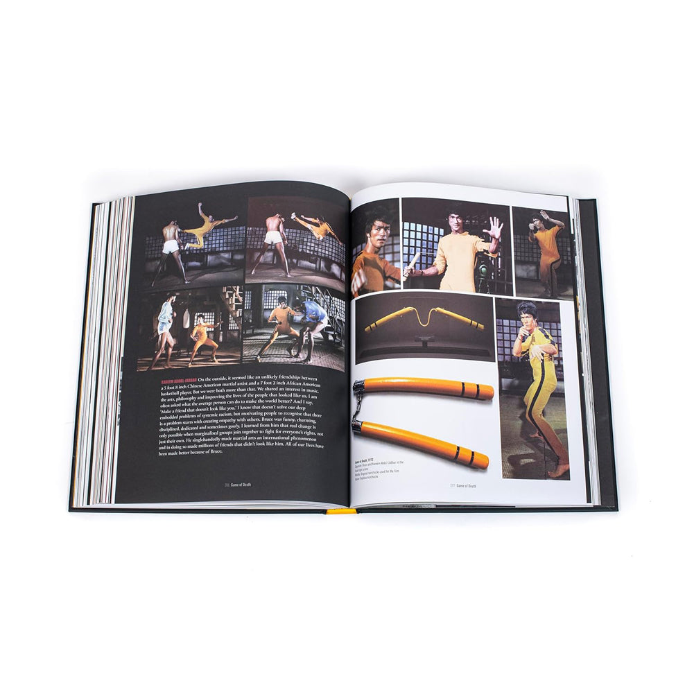 Open book showcasing colorful photographs and text on Bruce Lee and martial arts