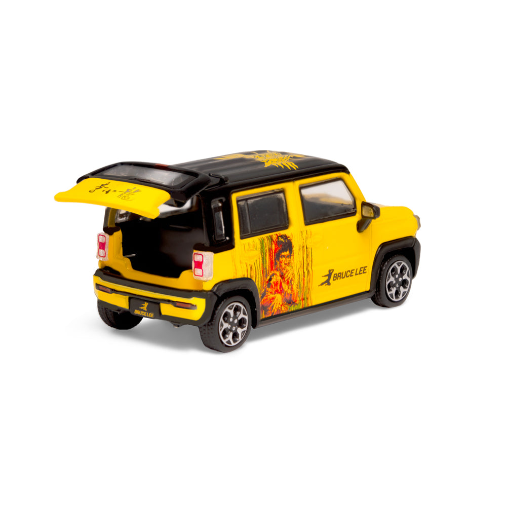 Yellow toy SUV with black roof, part of Bruce Lee BMC x TINY collection